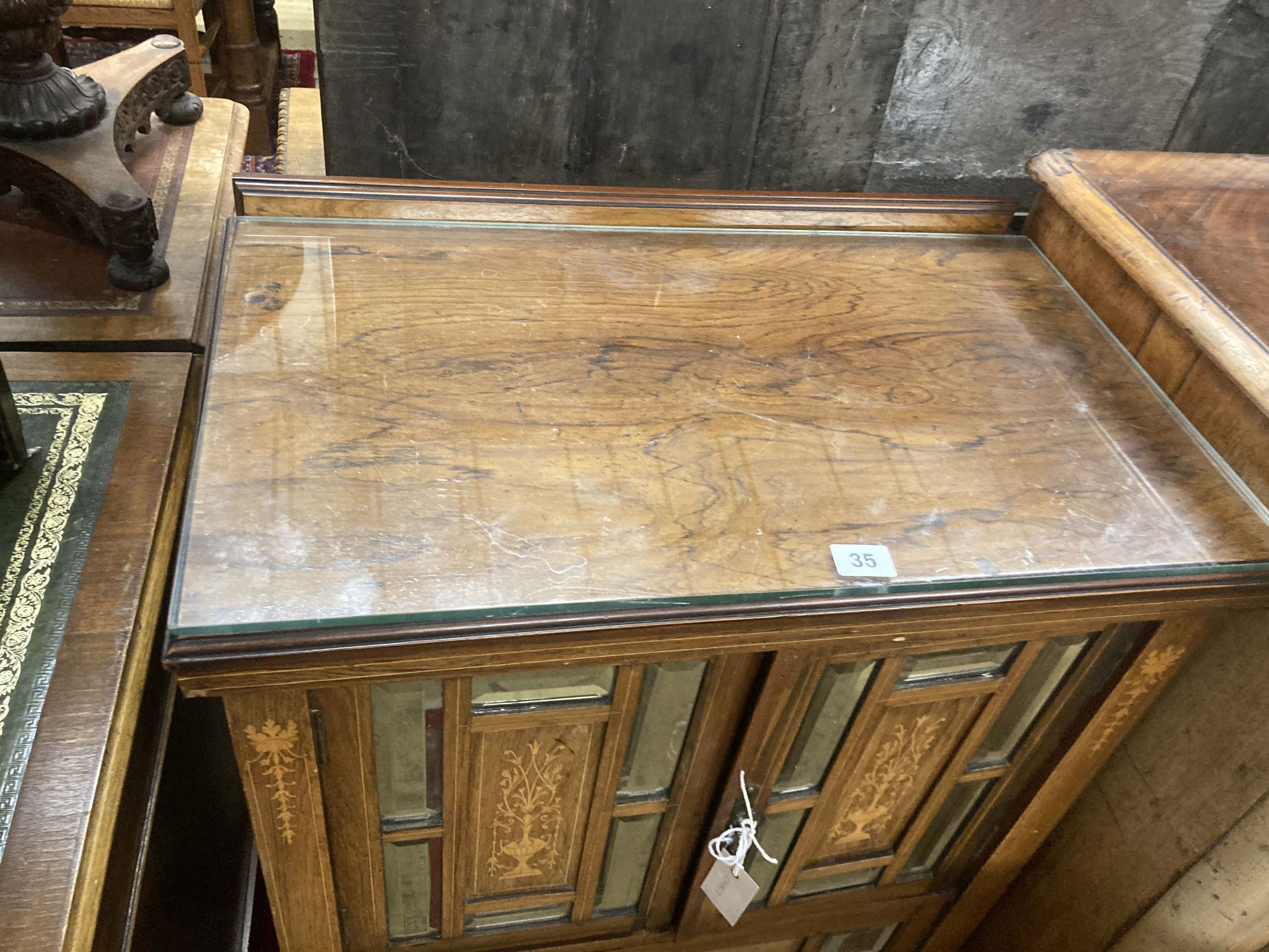 A late Victorian inlaid rosewood mirrored music cabinet, width 61cm, depth 38cm, height 105cm